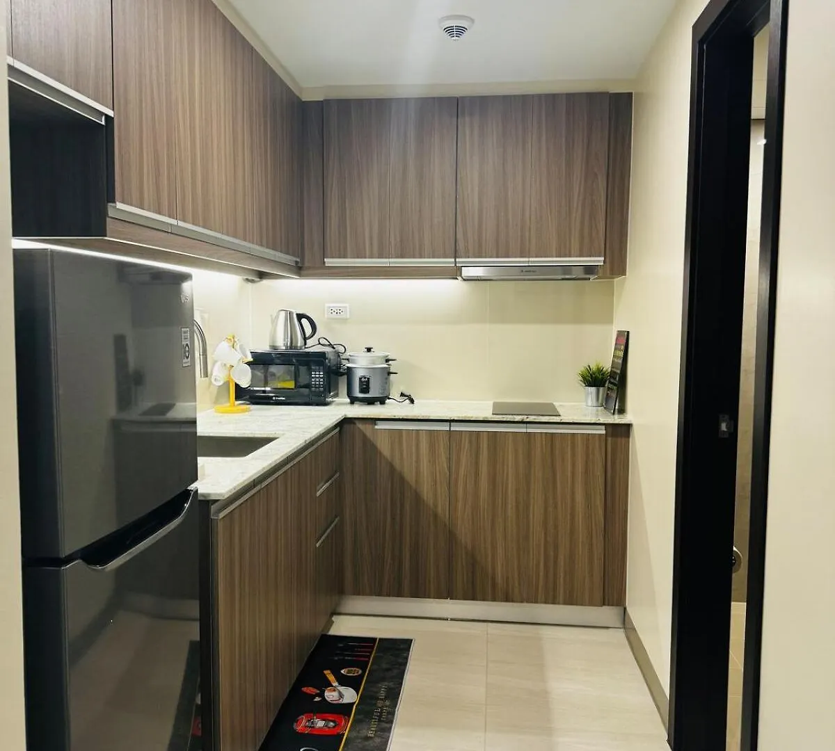 Apartment Cozy 1Br At Park Mckinley West Near Bgc & Venice Mall Manila